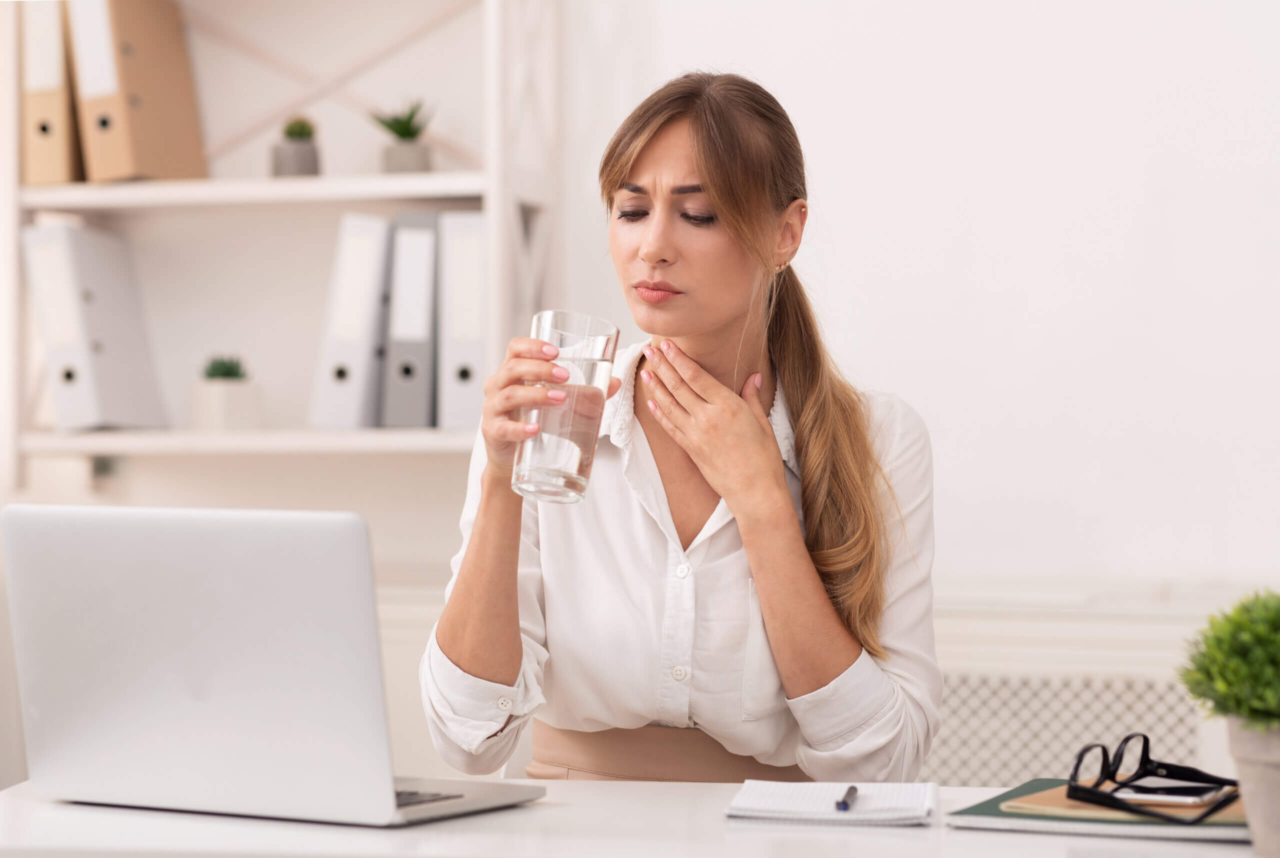 Sick Business Lady Having Sore Throat Holding Glass Of Water