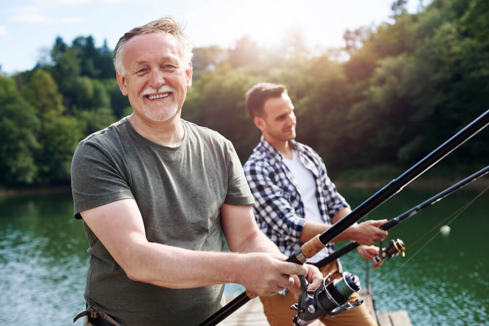 Father and son fishing who have autoimmune diseases